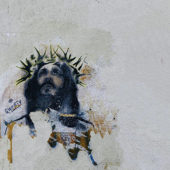 Jesusdarstellung als Graffity auf einer Wand.